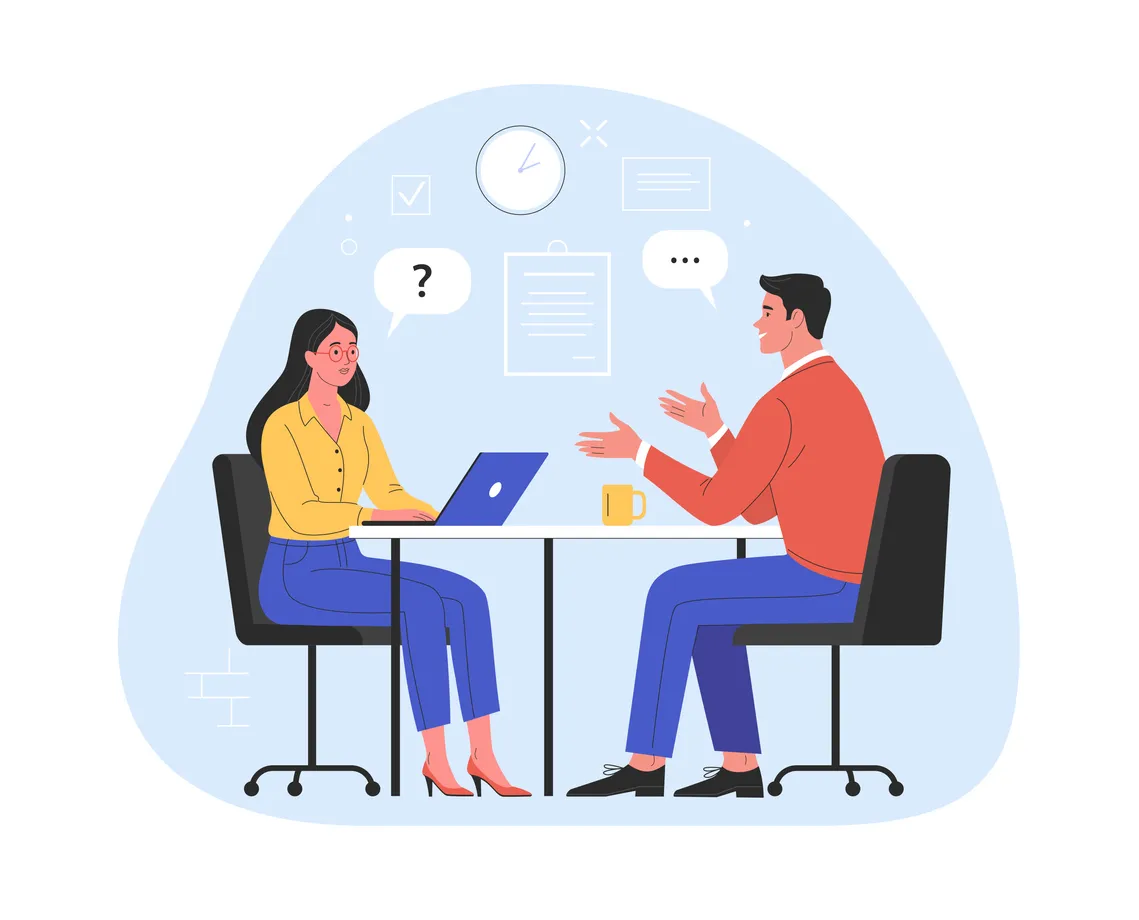 Female interviewer and male candidate discussing over table
